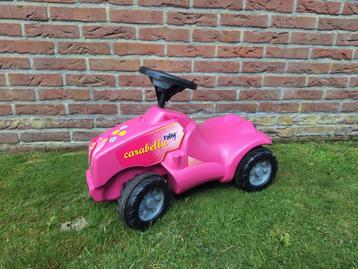 Roze looptractor beschikbaar voor biedingen