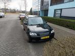 Mazda Demio 1.3 Comfort 2001 Zwart, Auto's, Mazda, Voorwielaandrijving, 410 kg, 63 pk, Zwart