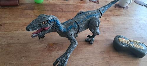 Afstandbediening lopende dino Blue velociraptor, Kinderen en Baby's, Speelgoed | Actiefiguren, Zo goed als nieuw, Ophalen of Verzenden