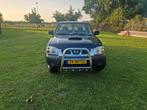Nissan Pick-up 2.5 D King CAB 4WD 2006, Auto's, Stof, Zwart, 4 cilinders, 133 pk