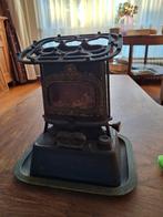 Petroleum stel antiek gietijzer, Ophalen