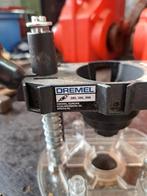 Dremel bovenfrees, Ophalen