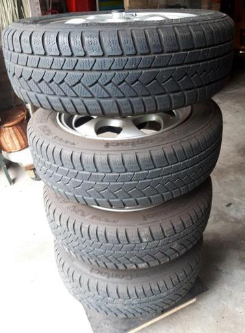 R50 2005 MINI Cooper sportvelgen met winterbanden  beschikbaar voor biedingen