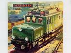 Originele Nederlandse Märklin catalogus 1964/65, Hobby en Vrije tijd, Modeltreinen | H0, Wisselstroom, Zo goed als nieuw, Märklin