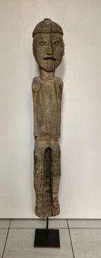 Nepal houten beeld, Ophalen