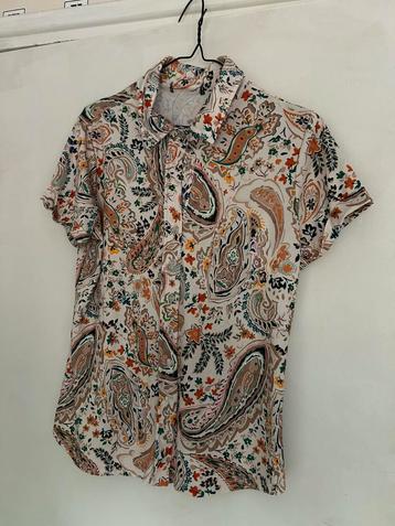 Damesblouse korte mouw beschikbaar voor biedingen