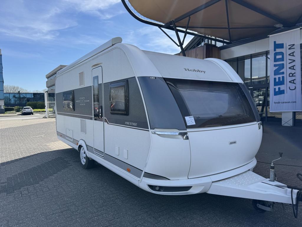 Hobby Prestige 560 WFU 2018 Mover,Airco,Luifel!!, Caravans en Kamperen, Standaardzit, Bedrijf, 5 tot 6 meter, Schokbreker