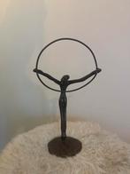 Bronzen beeldje van een figuur met hoepel, Ophalen