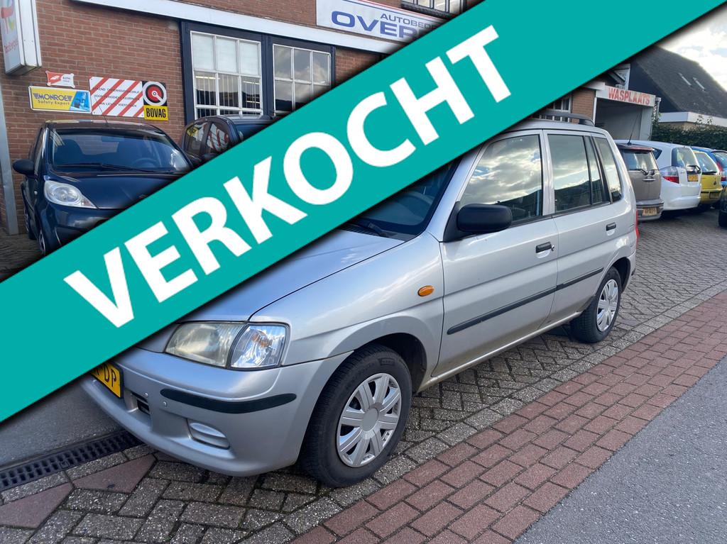 Mazda Demio 1.5 ExclusiveAutomaat, Auto's, Mazda, Metallic lak, Origineel Nederlands, Grijs, 75 pk