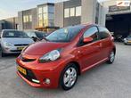 Toyota Aygo 1.0 VVT-i Dynamic Orange Airco Navi Led, Auto's, Voorwielaandrijving, Stof, Gebruikt, Overige kleuren