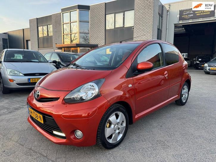 Toyota Aygo 1.0 VVT-i Dynamic Orange Airco Navi Led, Auto's, Toyota, Bedrijf, Te koop, Aygo, ABS, Achteruitrijcamera, Airbags