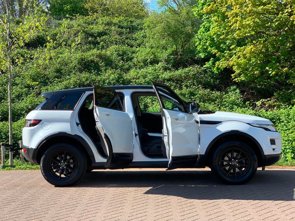 Land Rover Range Rover Evoque 2.2 TD4 4WD Prestige, Auto's, Euro 5, 150 pk, Wit, Leder