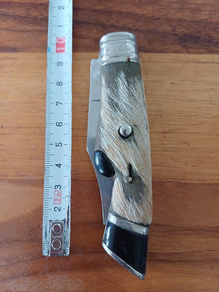 Zakmes met harige handgreep, Verzenden