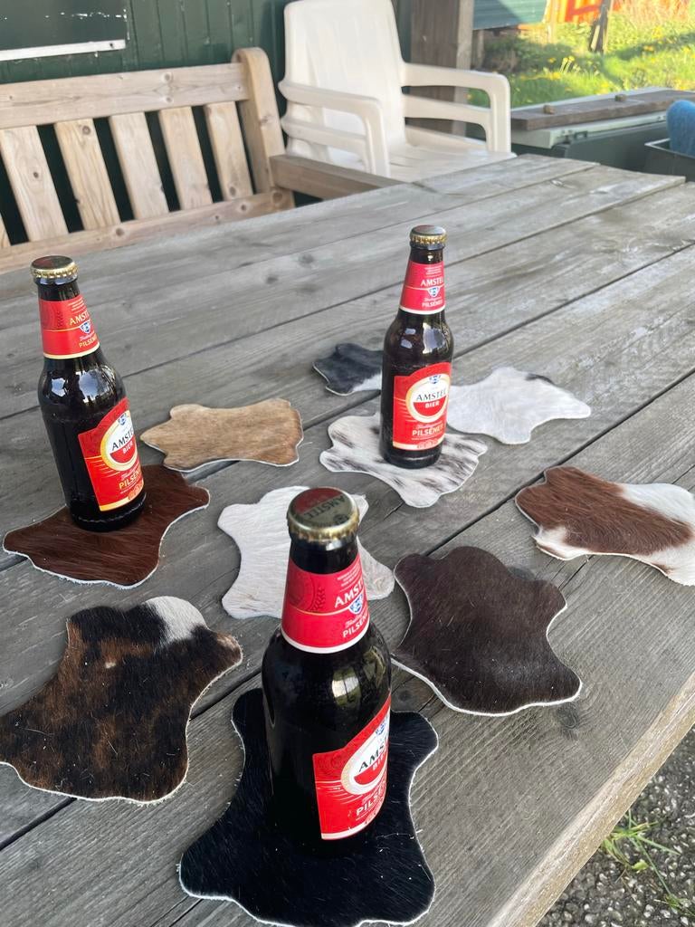 Unieke koeienhuid onderzetters voor tafel, Ophalen of Verzenden, Nieuw, Glas of Kopje