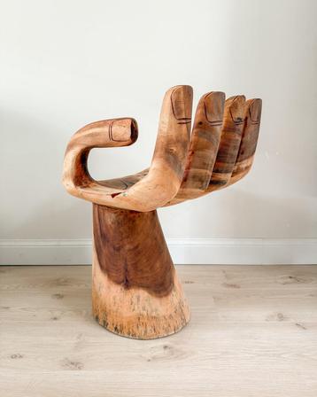 Vintage teakhouten handstoel beschikbaar voor biedingen