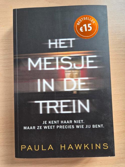 Paula Hawkins - Het meisje in de trein, Boeken, Thrillers, Zo goed als nieuw, Nederland, Ophalen of Verzenden