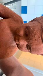 Terracotta Beeld van een Kind, Ophalen