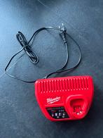 Milwaukee M12 Acculader - nieuw !!!, Doe-het-zelf en Verbouw, Gereedschap | Machine-onderdelen en Toebehoren, Ophalen, Nieuw