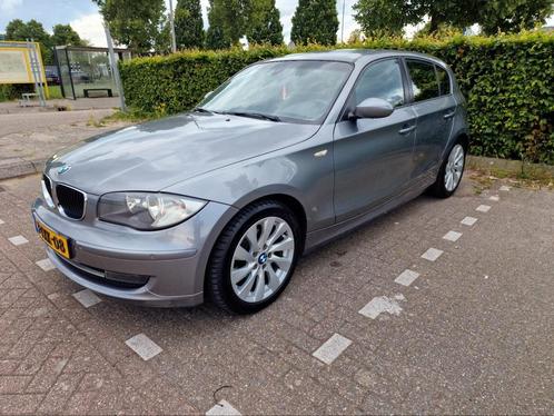 BMW 1-Serie 1.6 I 116 5DR AUT 2009 Grijs, Auto's, BMW, Particulier, 1-Serie, ABS, Adaptive Cruise Control, Airbags, Airconditioning
