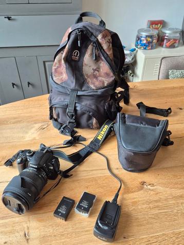 Nikon D60  digitale spiegelreflexcamera met extra's beschikbaar voor biedingen