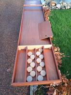 Wedstrijd sjoelbak, Ophalen