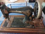 Antieke naaimachine, Ophalen