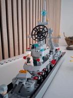 Bouwstenen lego marine boot, Ophalen