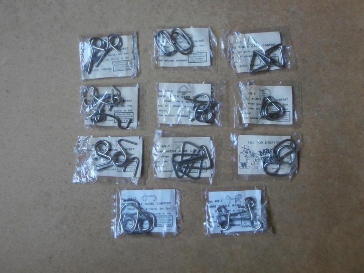 10 Magic tricks brain trainer metalen breinbreker Hong Kong, Hobby en Vrije tijd, Denksport en Puzzels, Zo goed als nieuw, Ophalen of Verzenden