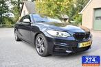 BMW 2-serie Coupé M235i xDrive High Executive, Auto's, Gebruikt, 4 stoelen, Zwart, Leder