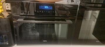 Te koop: AEG KME761000B Inbouw Combi-Magnetron – 43L / 3000W beschikbaar voor biedingen