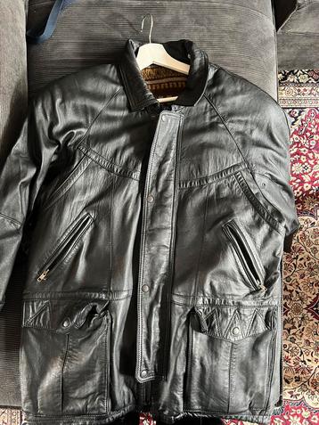 Black 100% leather jacket with padding. Size L
