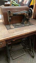 Antieke naaimachine, Ophalen