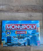 Monopoly Almere in seal, Hobby en Vrije tijd, Gezelschapsspellen | Bordspellen, Ophalen of Verzenden, Zo goed als nieuw