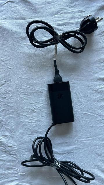 HP 65W smartnet adapter beschikbaar voor biedingen