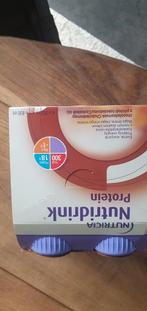Nutridrink protein chocolade   2 sets van 4 flesjes, Sport en Fitness, Ophalen of Verzenden, Nieuw, Poeder of Drank
