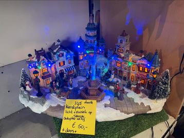 Kerstdorp plein met mooi licht beschikbaar voor biedingen