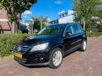 Volkswagen Tiguan 1.4 TSI 4MOTION Leer | Panoramadak, Auto's, Volkswagen, 4 cilinders, 2000 kg, Zwart, Origineel Nederlands