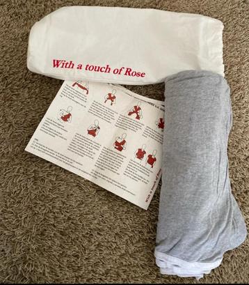 With a touch of Rose Draagdoek beschikbaar voor biedingen
