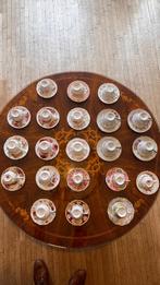 Kopjes en schoteltjes, Ophalen