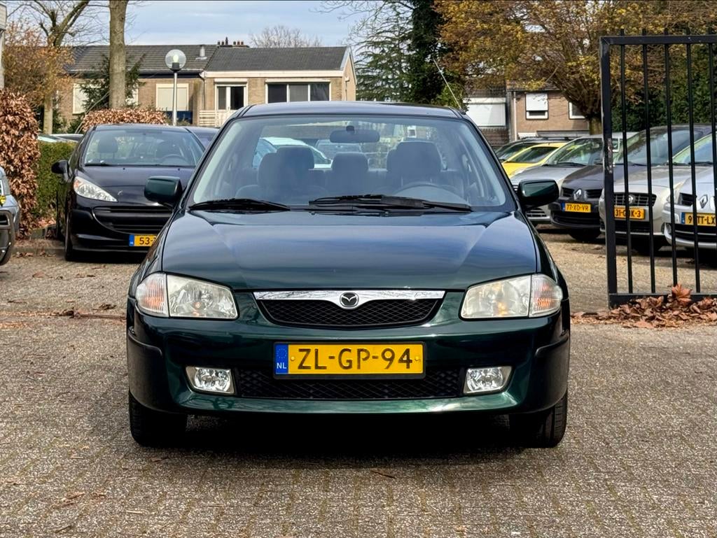 Nette Mazda 323 1.5 SDN LX 1999 Groen, 4 cilinders, 400 kg, Origineel Nederlands, 1200 kg