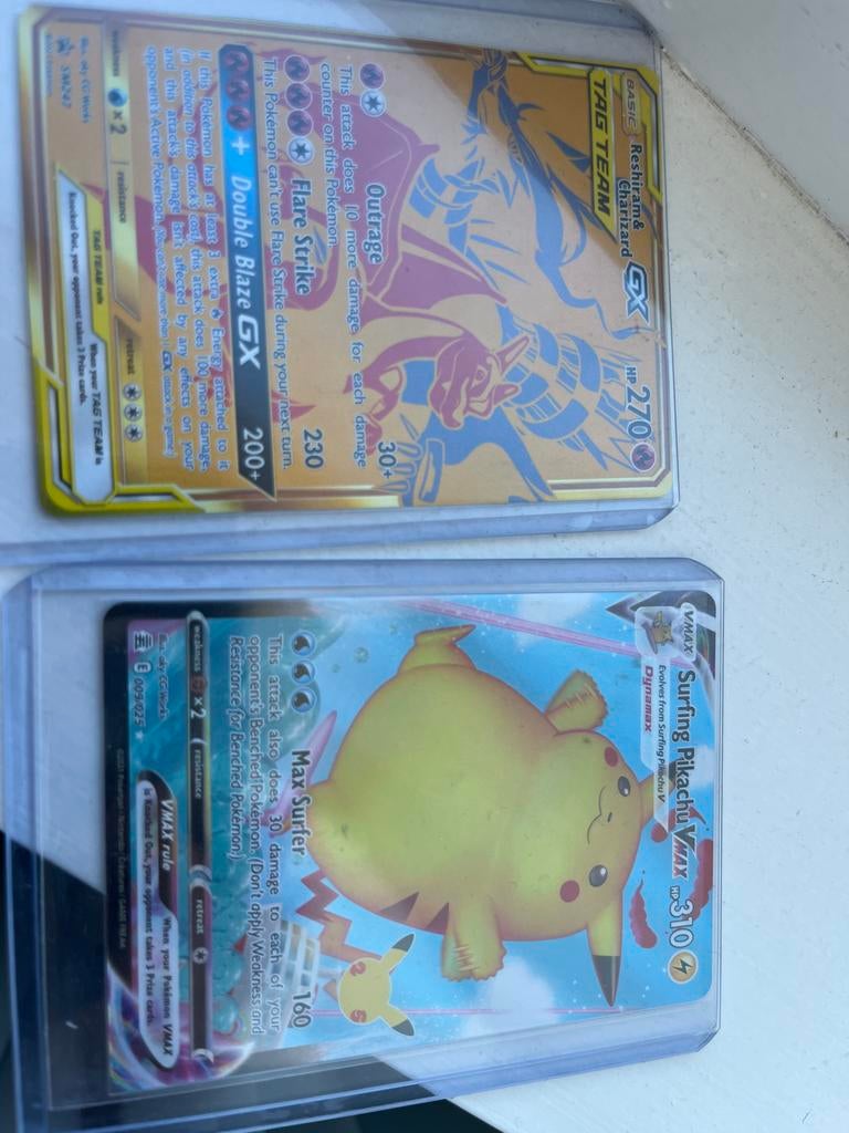 Pokémon Kaarten: Reshiram & Charizard GX & Surfing Pikachu V, Ophalen of Verzenden, Zo goed als nieuw, Meerdere kaarten