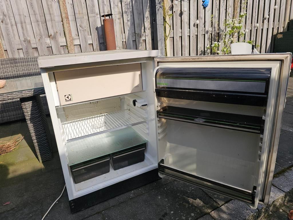 Koelkast met vriesvakje, Ophalen