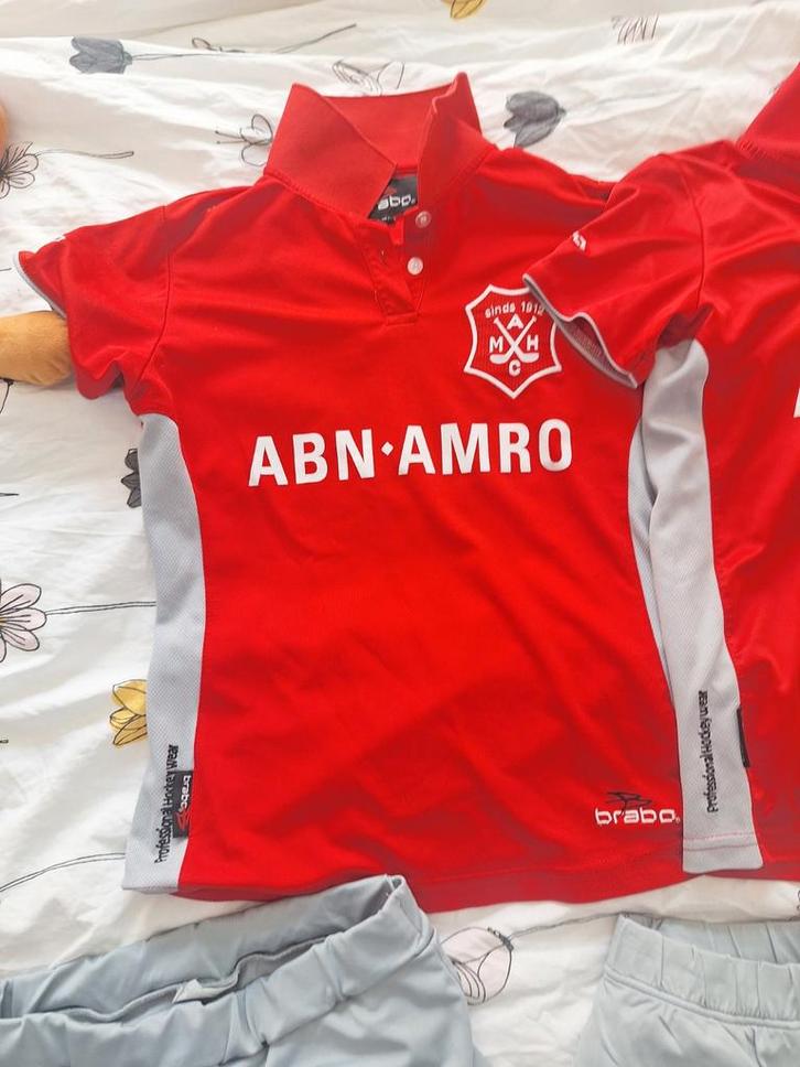 Rood Brabo Hockey Shirt ABN AMRO 164, Kleding | Dames, Sportkleding, Zo goed als nieuw, Overige typen, Maat 38/40 (M), Rood, Ophalen of Verzenden