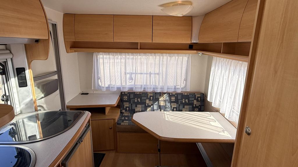 Home-Car Racer 43 TMF bouwjaar 2005 met (zak)luifel, Caravans en Kamperen, Caravans, Home-car, Bedrijf, Treinzit, 750 - 1000 kg