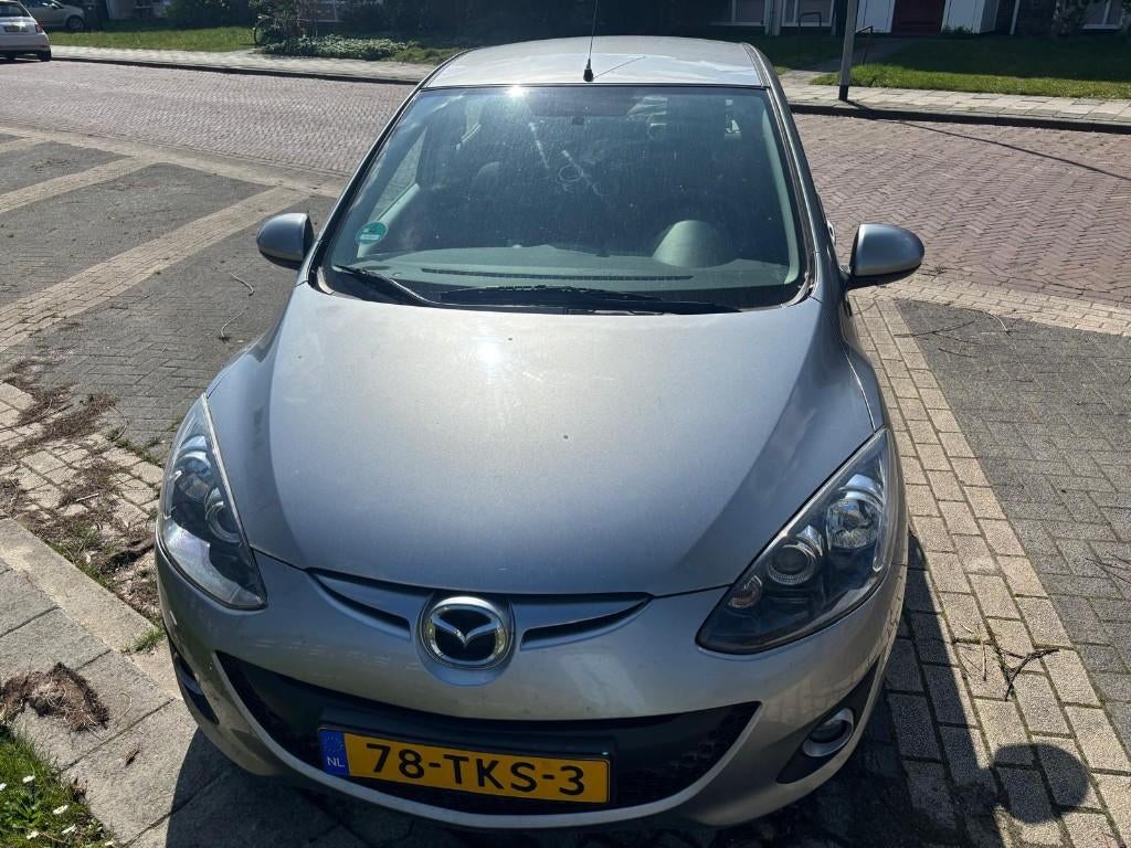 Mazda 2 1.3 Bifuel 62KW 5DRS 2012 Grijs, Voorwielaandrijving, Euro 5, 37 €/maand, Beige