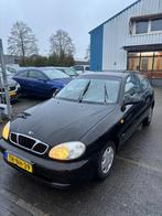 Daewoo Lanos 1.5 SE, Auto's, Daewoo, 86 pk, 4 cilinders, Zwart, Origineel Nederlands