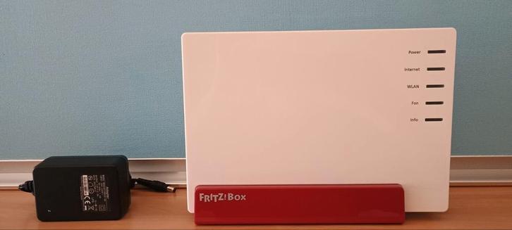 Fritzbox 7581 VDSL Modem/Router - Incl. Adapter, Computers en Software, Routers en Modems, Ophalen of Verzenden