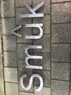 Geveldecoratie van cortenstaal, Ophalen