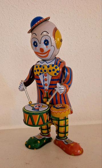 Blikken speelgoed trommelende clown  beschikbaar voor biedingen