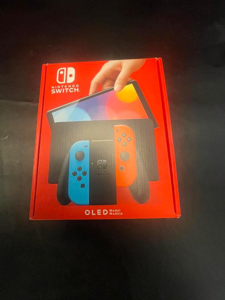 Te koop Nintendo switch oled rood / blauw, Spelcomputers en Games, Spelcomputers | Nintendo Switch, Nieuw, Switch OLED, Met 2 controllers